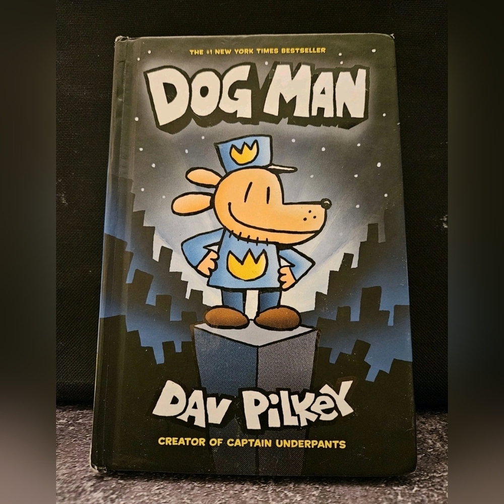 Dog Man by - Black and Blue Hardcover